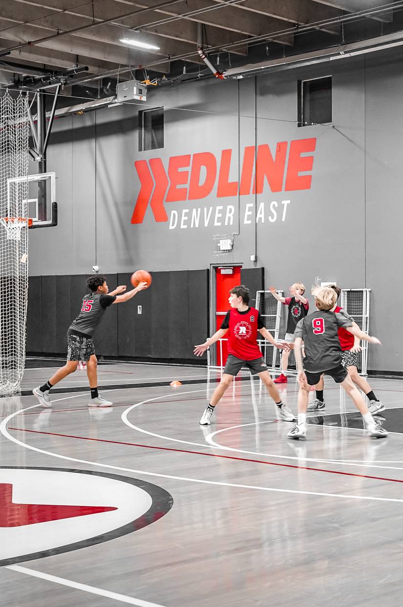 title youth boys playing 3 on 3 basketball