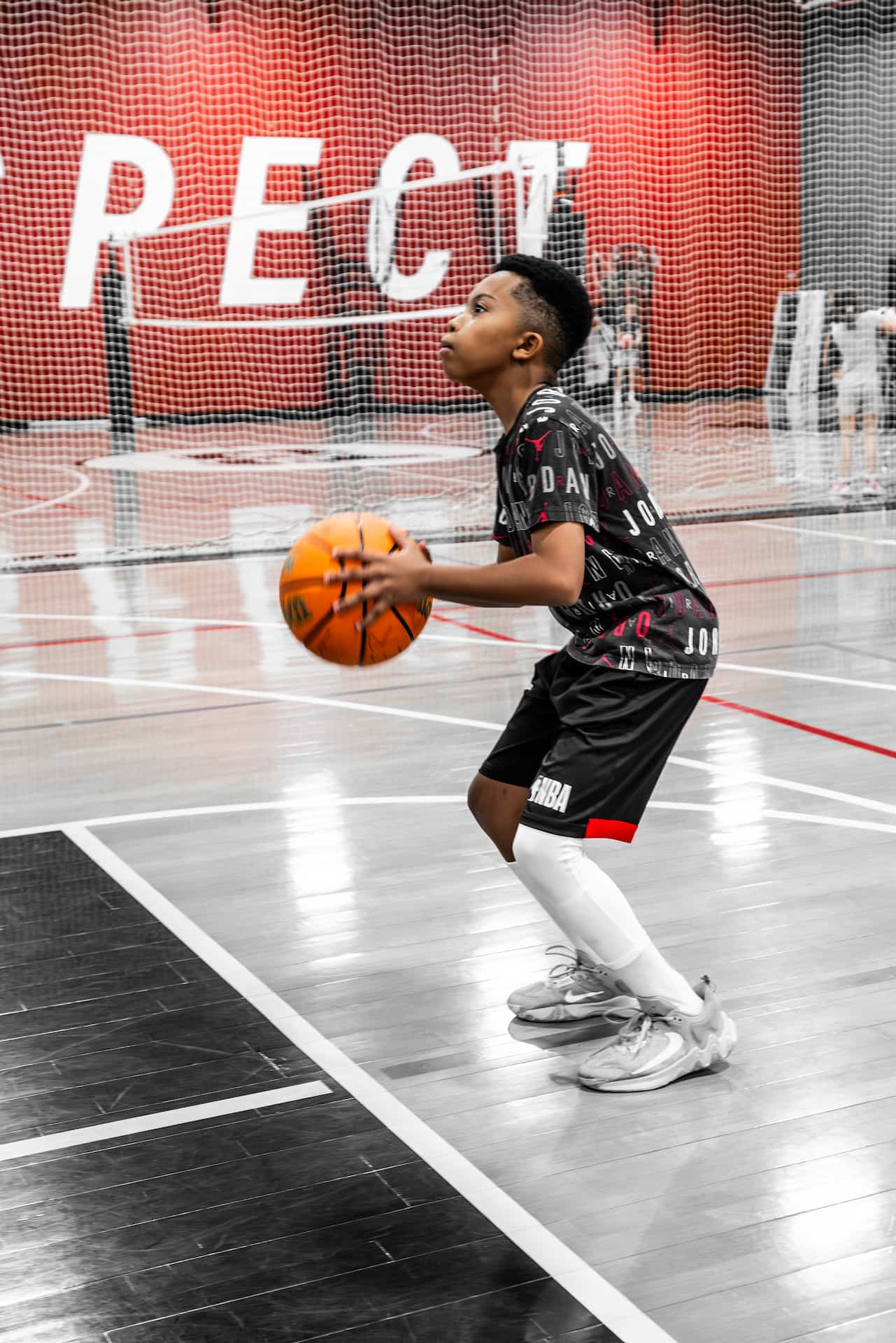 youth athlete shooting a free throw
