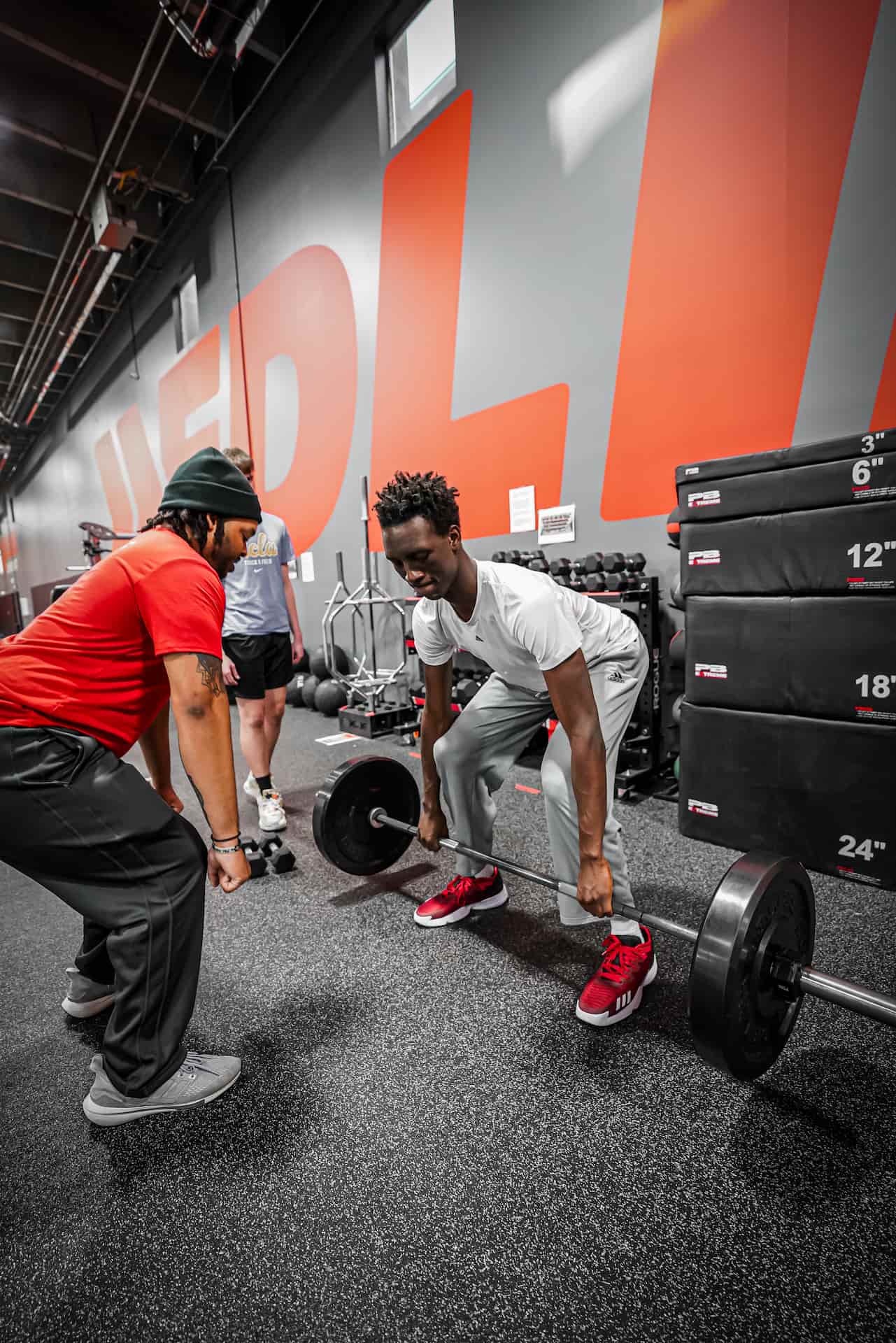 mens basketball player deadlifting