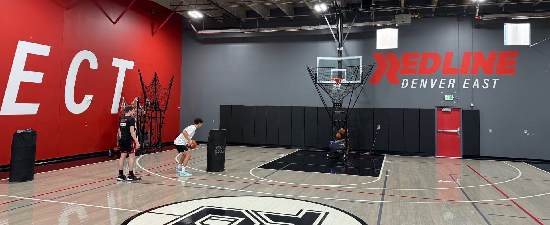 two players shooting on a shooting machine