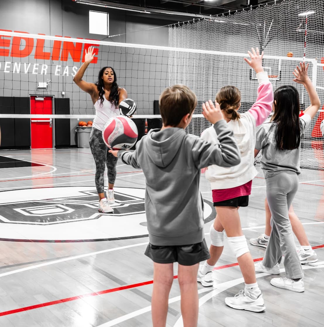 volleyball players take serving lessons from coach jenelle