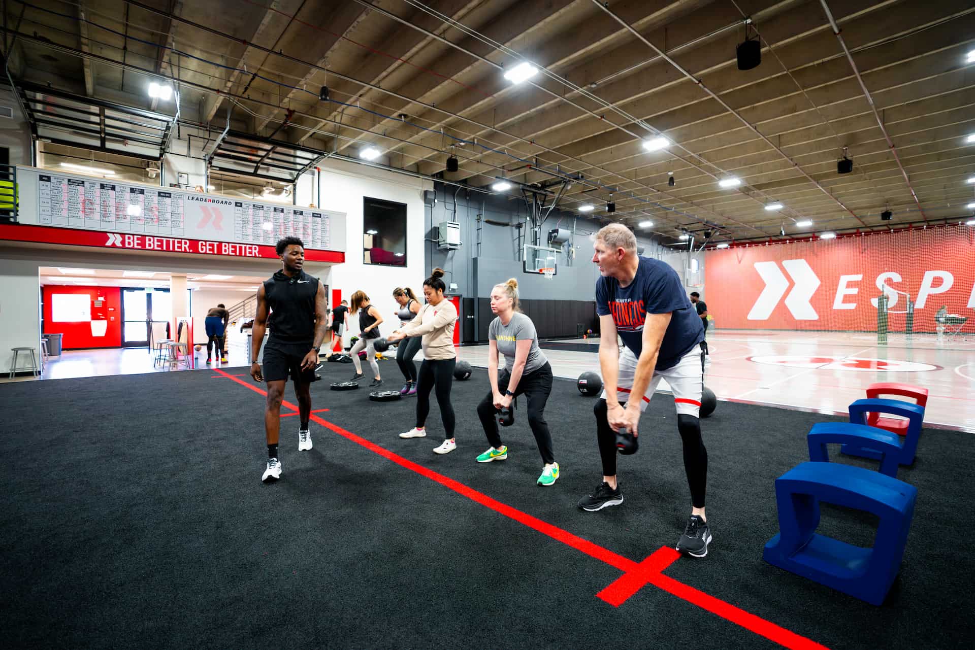 adult athletes kettle bell swinging