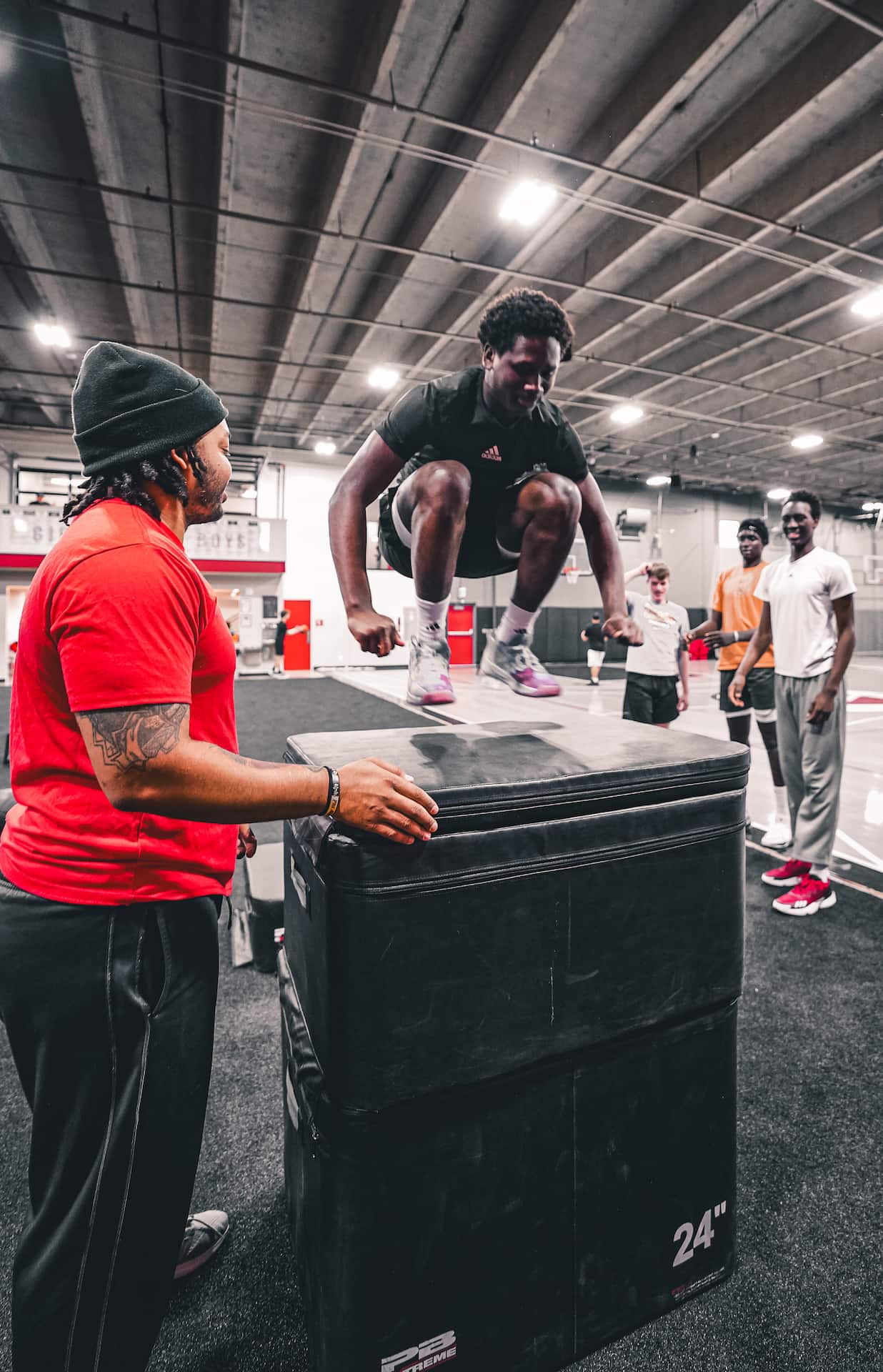title athlete box jumping