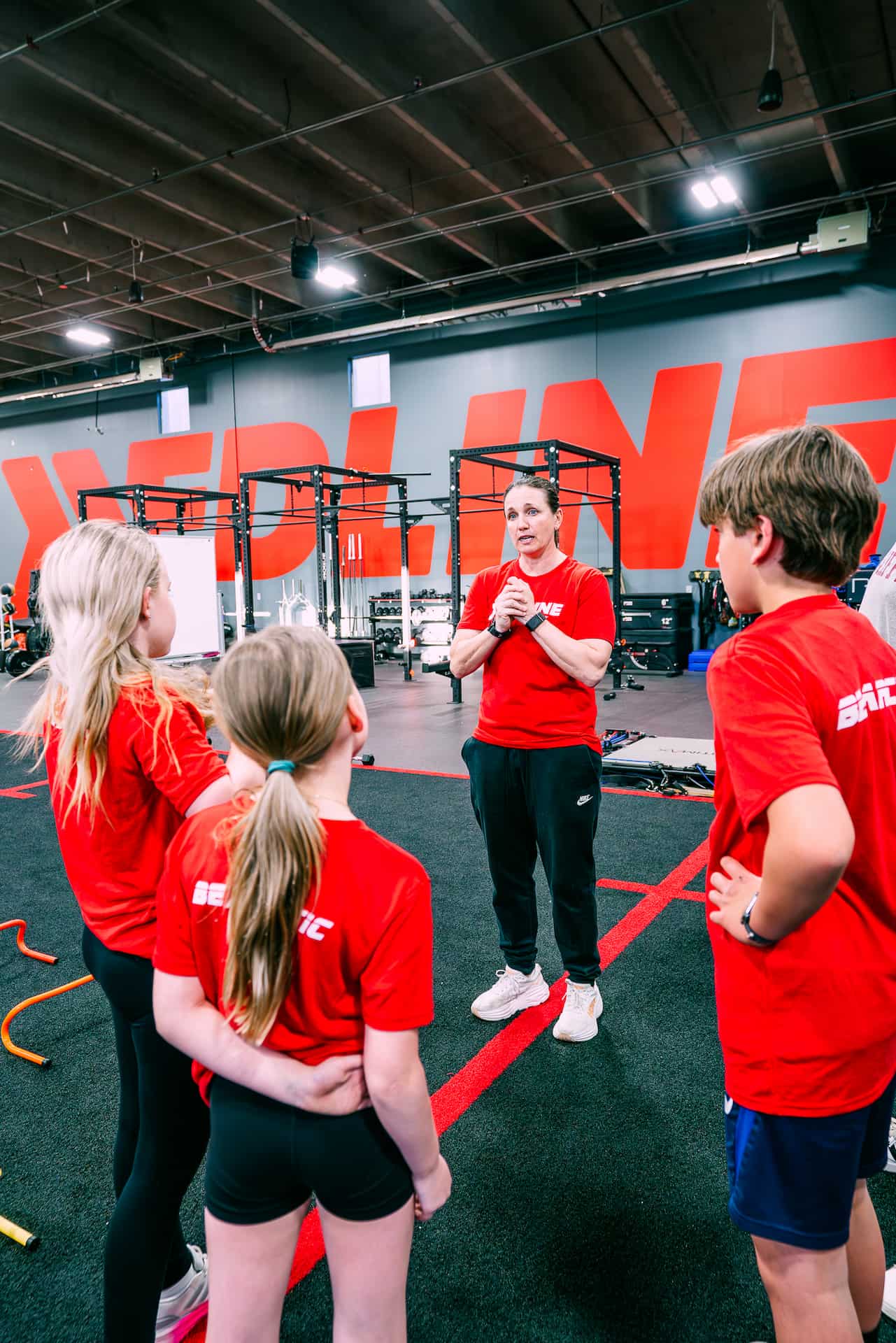 athletes receive instruction from coach